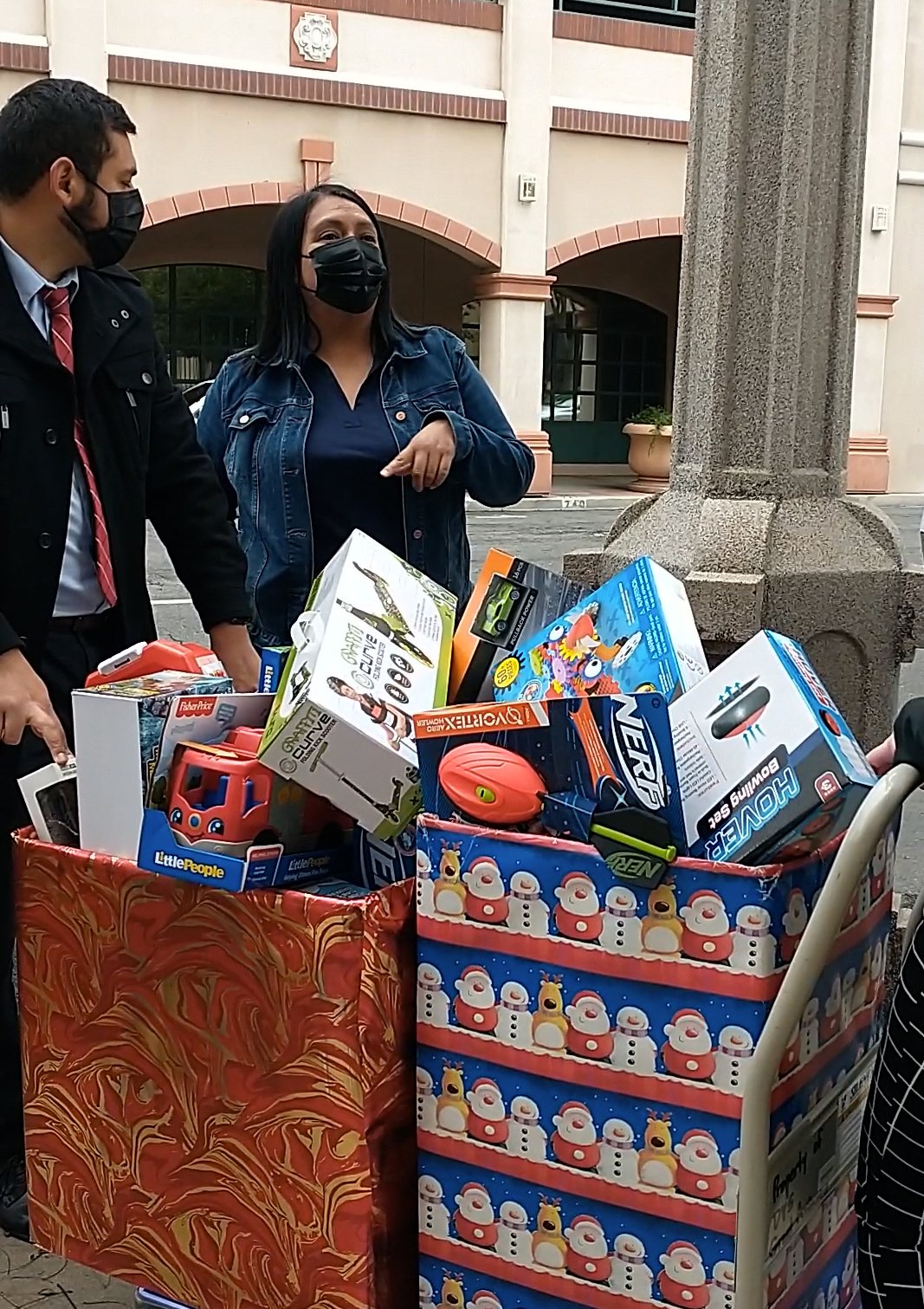 Laura Huerta drops off gifts to DVS from La Sierra Little League